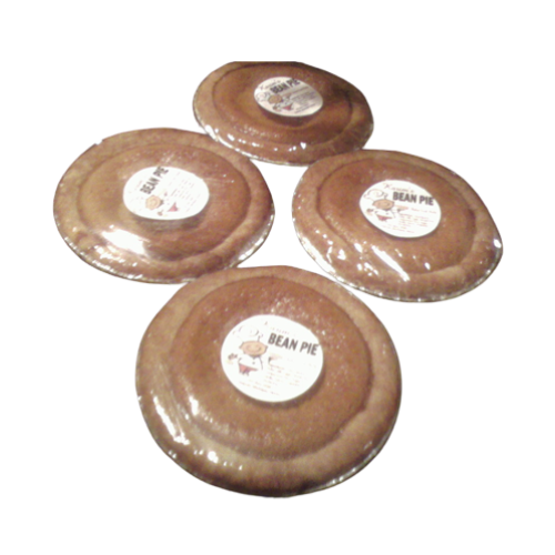 Four bean pies in clear plastic wrap with 'Bean Pie' labels on a white background