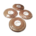 Four bean pies in clear plastic wrap with 'Bean Pie' labels on a white background