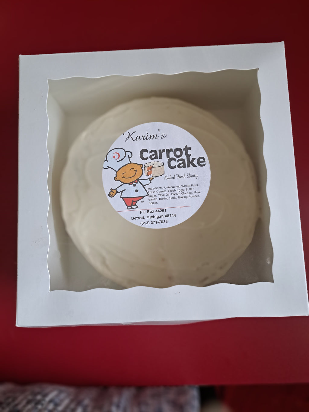 Karim's Carrot Cake in a white paper box