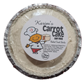 Carrot cake in a foil pan with a 'Karim's Carrot Cake' label on a white background